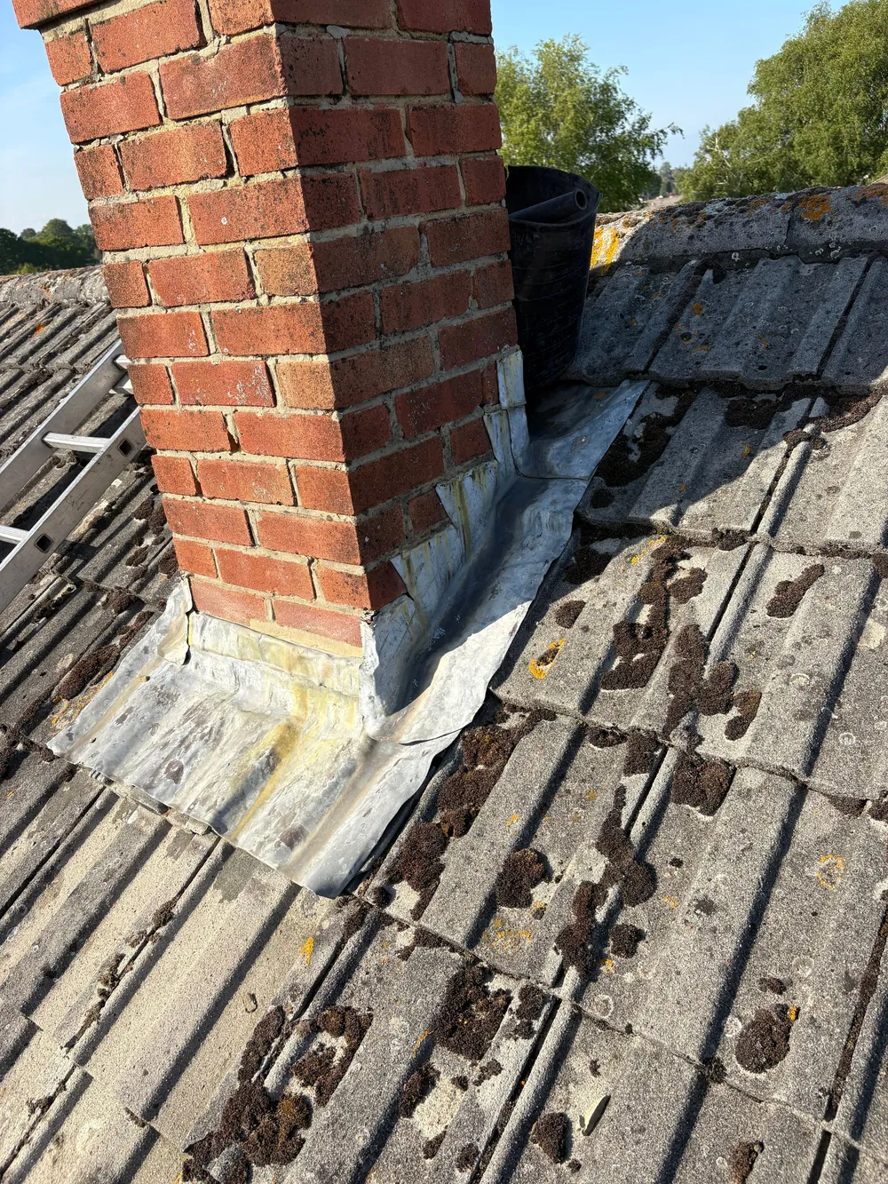 After: new welded code 4 lead front apron and soakers fitted neatly around the same chimney